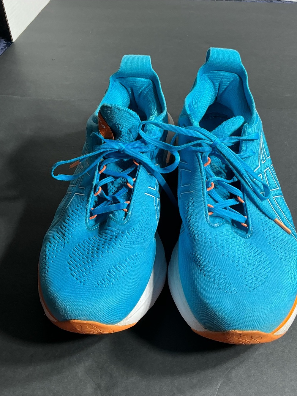 Men's Blue ASICS  25  pure gelAthletic Running Shoes with Orange Accents